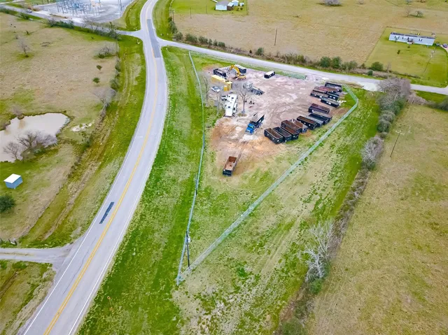 a view of swimming pool with a yard