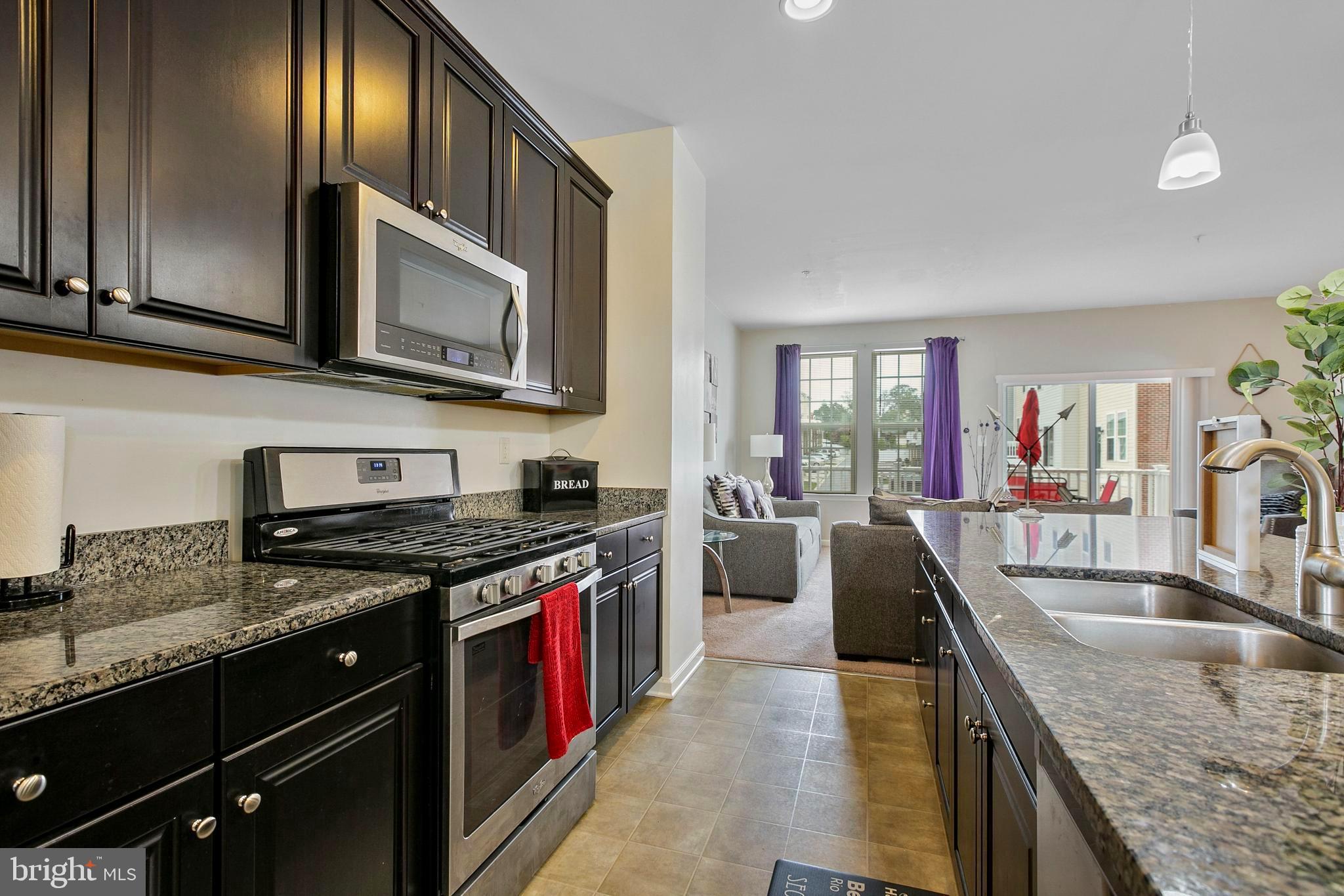 8857 Delegge Road Baltimore, MD 21237 - Photo 16 of 41 5 Piece Kitchen with Rich Dark 42" Cabinets