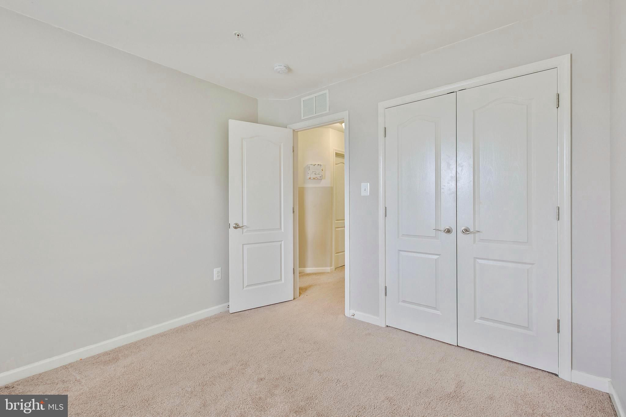 8857 Delegge Road Baltimore, MD 21237 - Photo 35 of 41 3rd Bedroom Double Door Closet Space