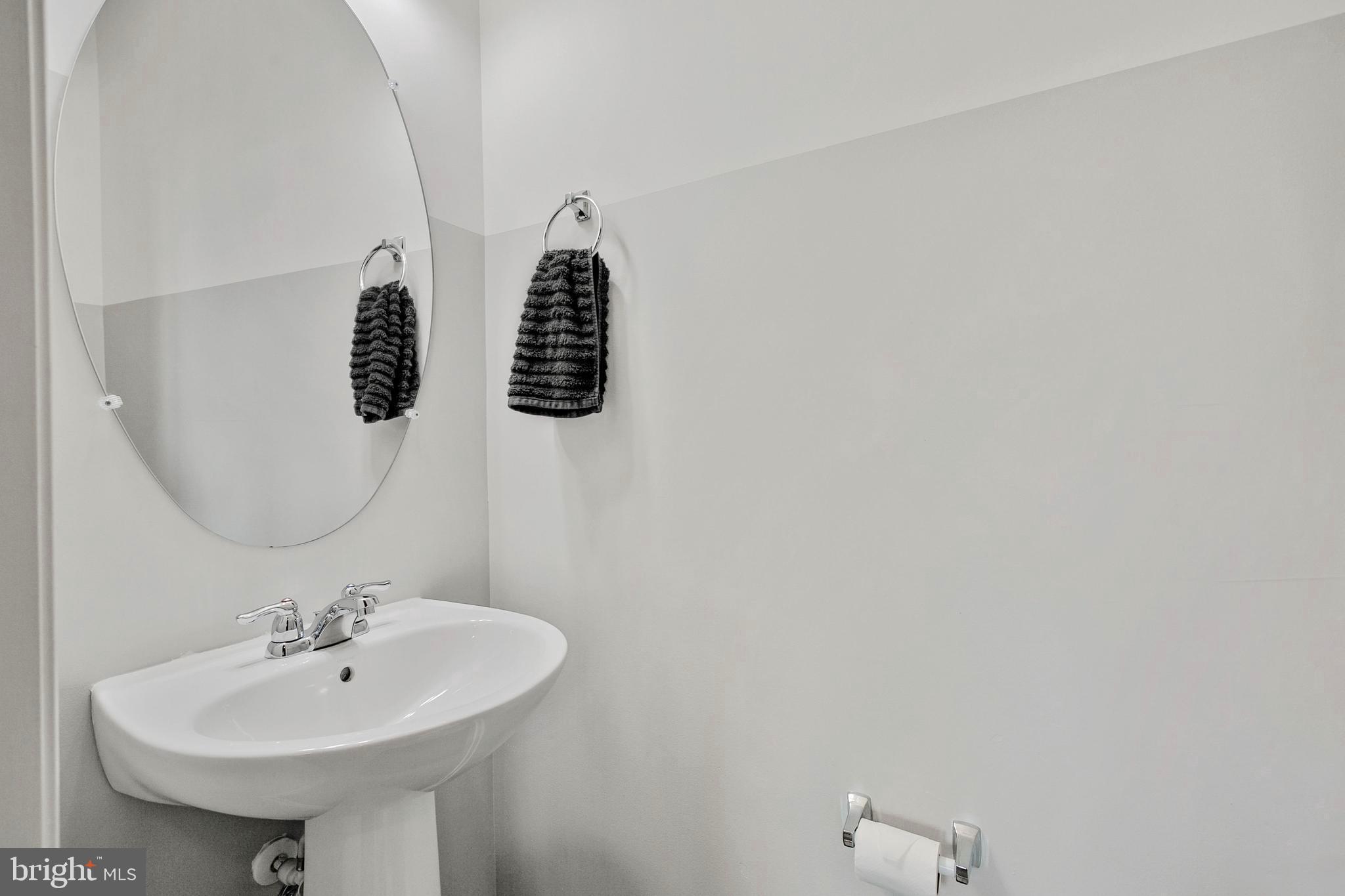 8857 Delegge Road Baltimore, MD 21237 - Photo 10 of 41 Sleek 1st Floor Bathroom