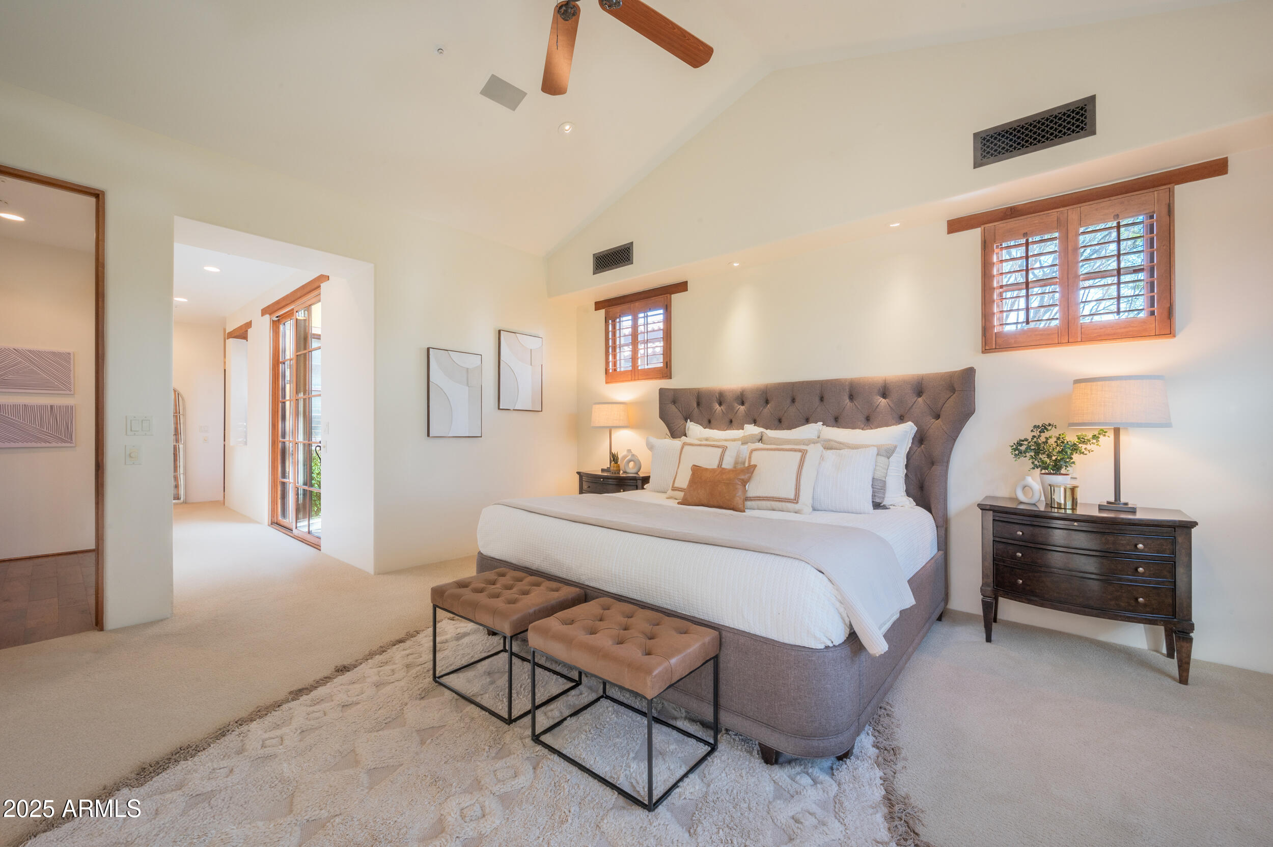 10575 East Rising Sun Drive Scottsdale, AZ 85262 - Photo 24 of 48 a bedroom with a bed a table and chair