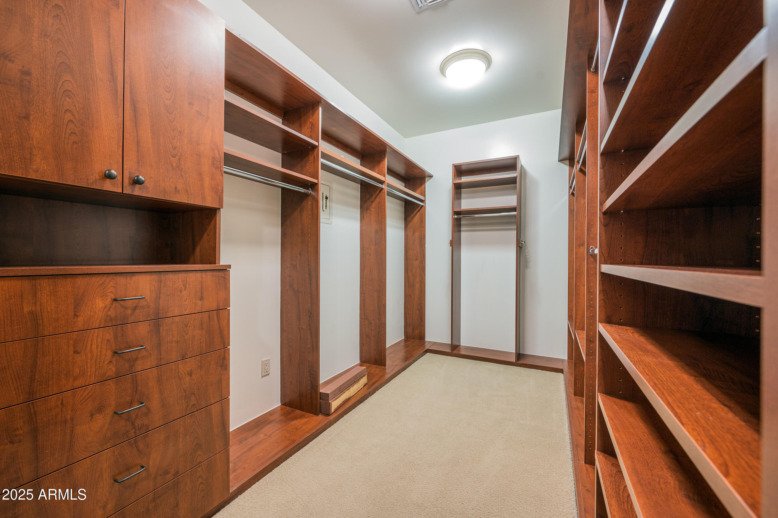 10575 East Rising Sun Drive Scottsdale, AZ 85262 - Photo 32 of 48 a view of walk in closet with empty racks