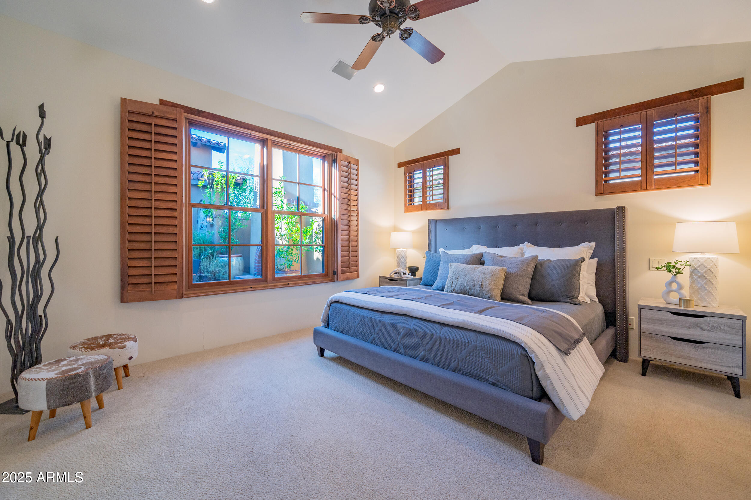 10575 East Rising Sun Drive Scottsdale, AZ 85262 - Photo 34 of 48 a spacious bedroom with a bed and a window