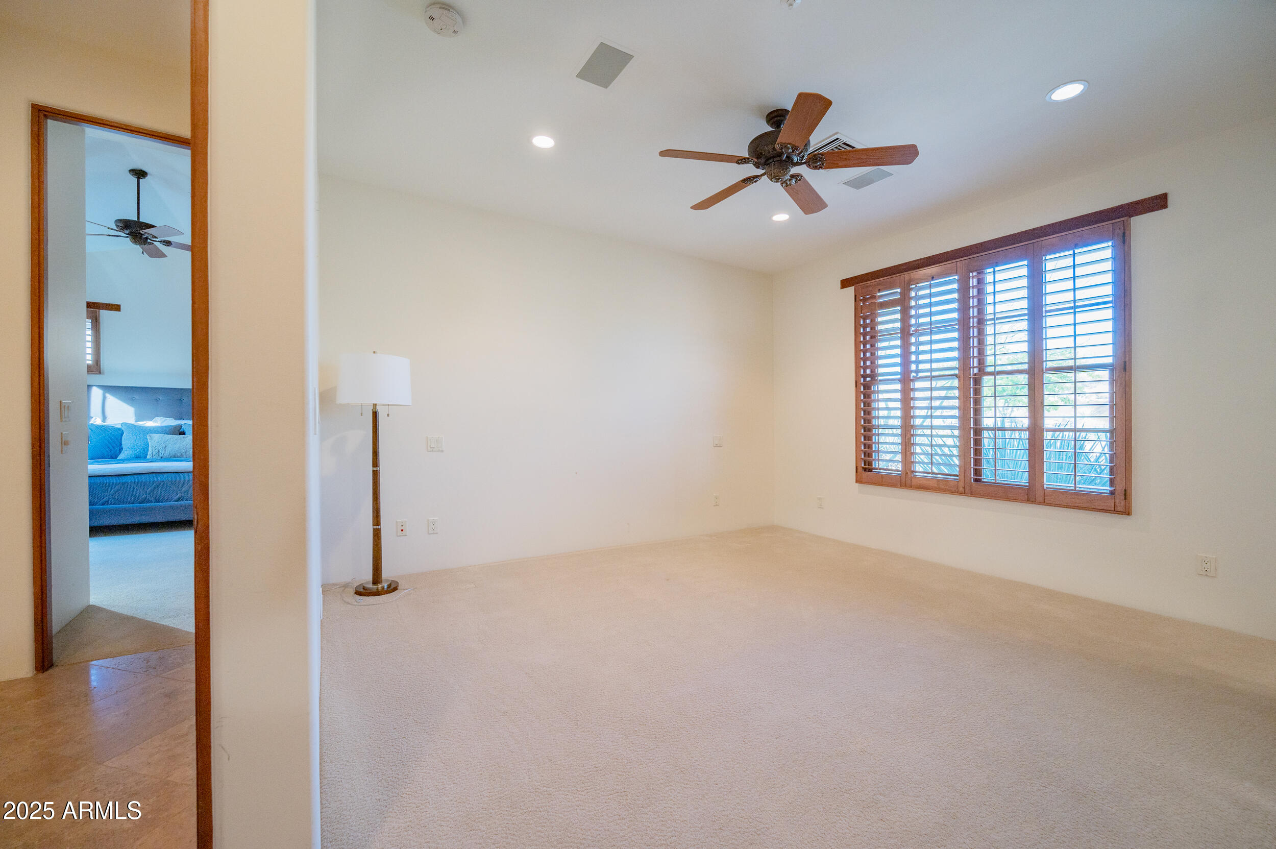 10575 East Rising Sun Drive Scottsdale, AZ 85262 - Photo 38 of 48 wooden floor in an empty room with a window