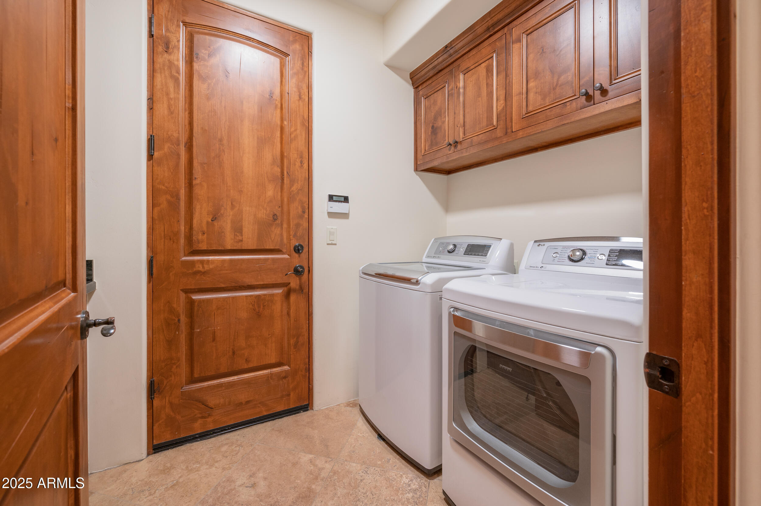 10575 East Rising Sun Drive Scottsdale, AZ 85262 - Photo 43 of 48 a utility room with dryer and washer