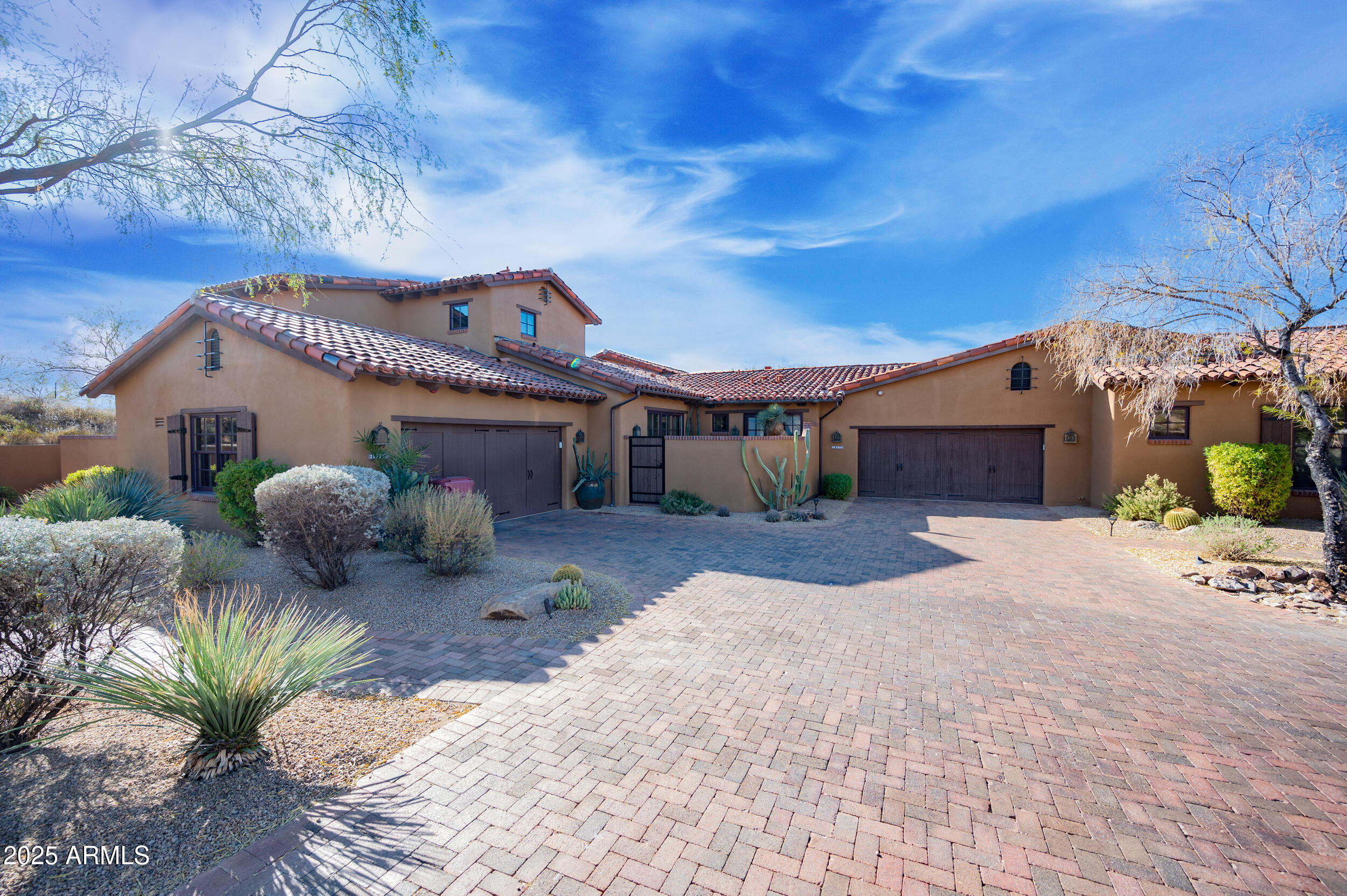 10575 East Rising Sun Drive Scottsdale, AZ 85262 - Photo 45 of 48 a front view of a house with a yard and garage