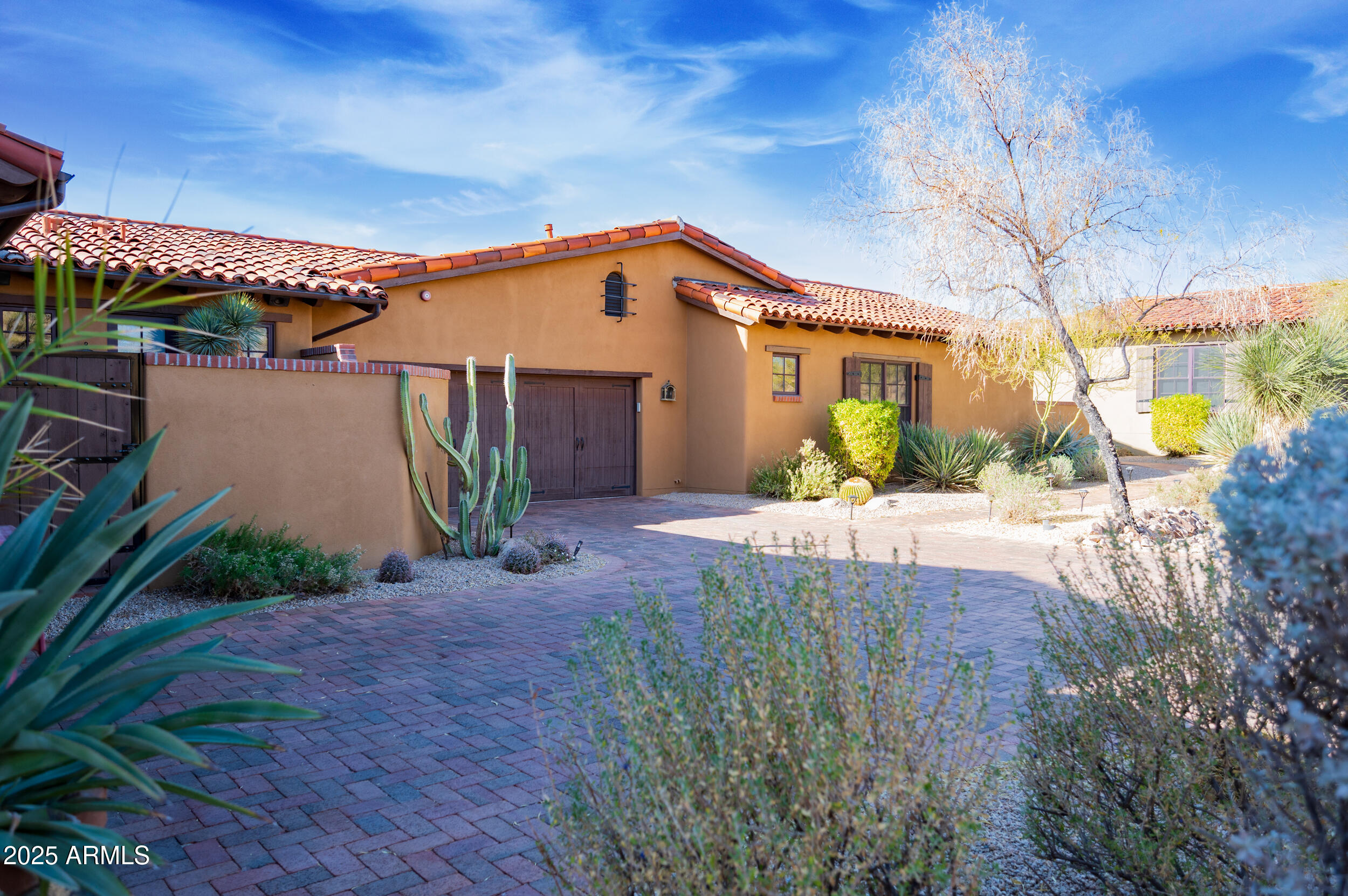 10575 East Rising Sun Drive Scottsdale, AZ 85262 - Photo 46 of 48 a front view of a house with garden