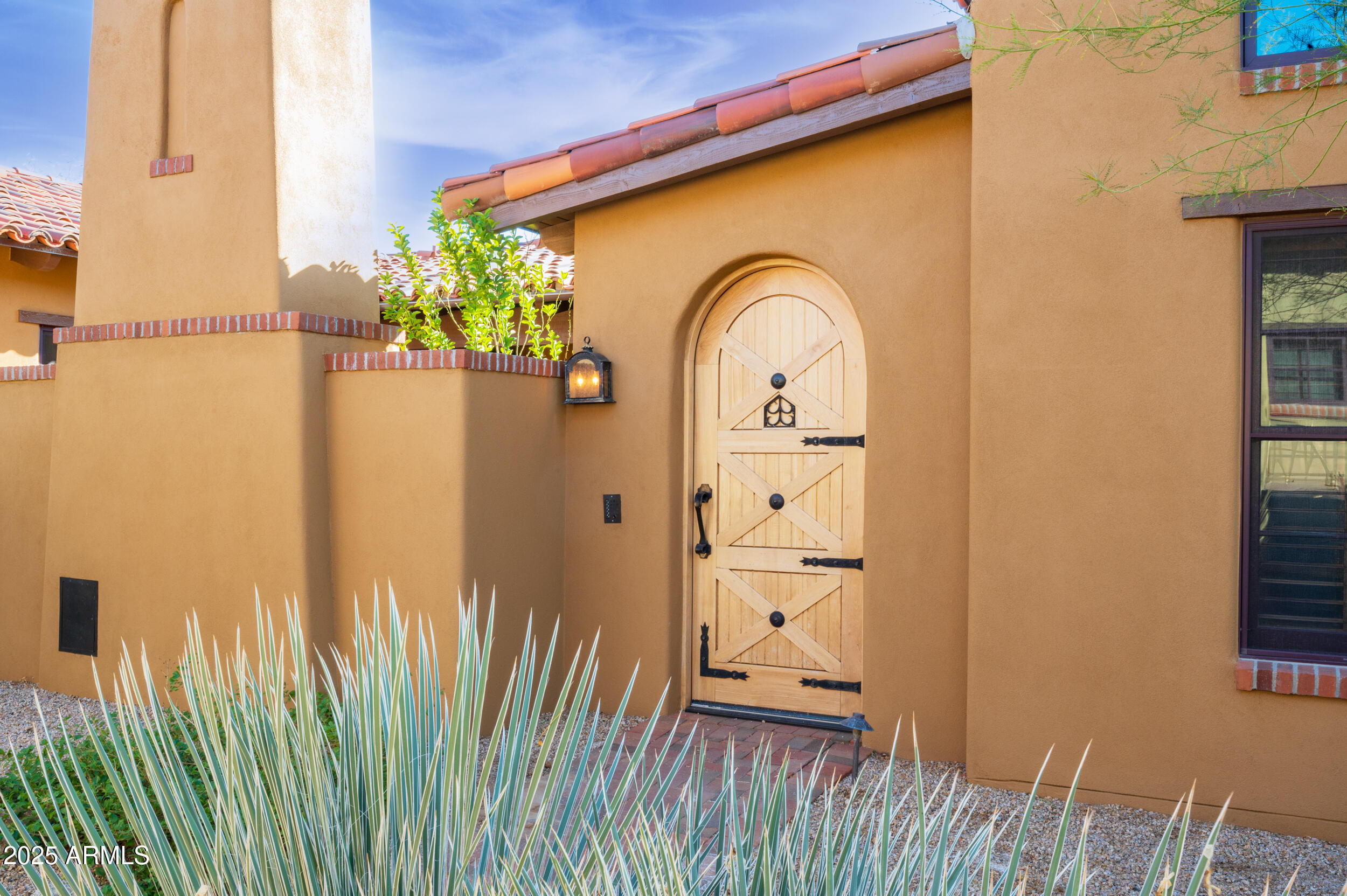 10575 East Rising Sun Drive Scottsdale, AZ 85262 - Photo 48 of 48 a front view of a house with garden