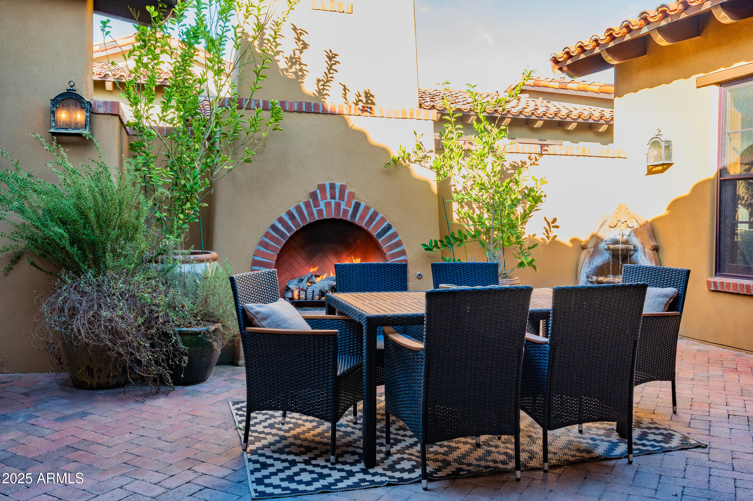 10575 East Rising Sun Drive Scottsdale, AZ 85262 - Photo 5 of 48 a view of a chairs and table in the patio