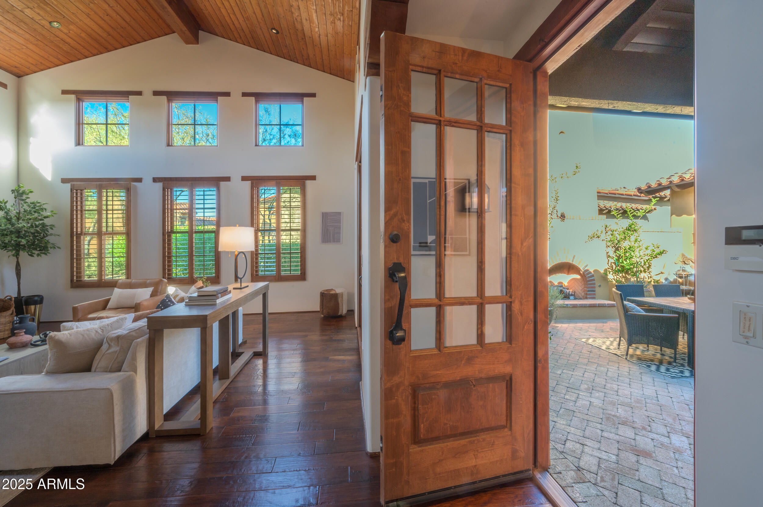 10575 East Rising Sun Drive Scottsdale, AZ 85262 - Photo 7 of 48 a living room with furniture and a window