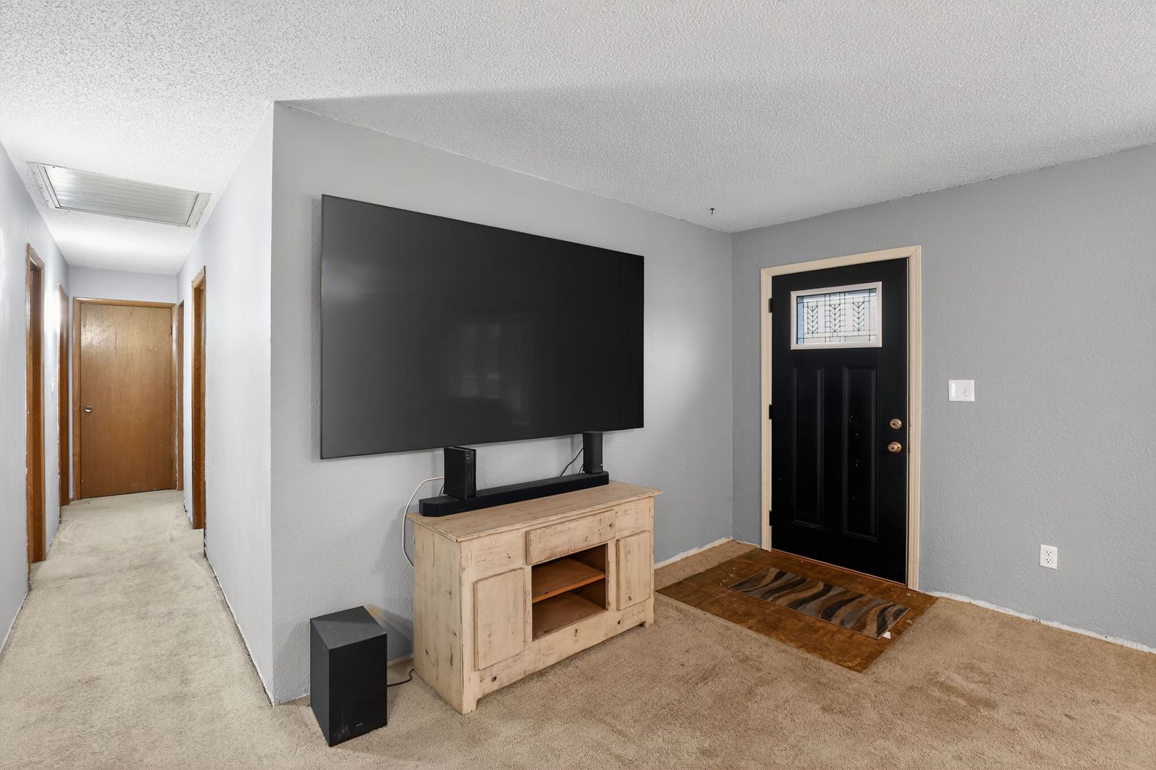 1531 North Charleston Road Salem, IL 62881 - Photo 6 of 34 a living room with a flat screen tv and a fireplace