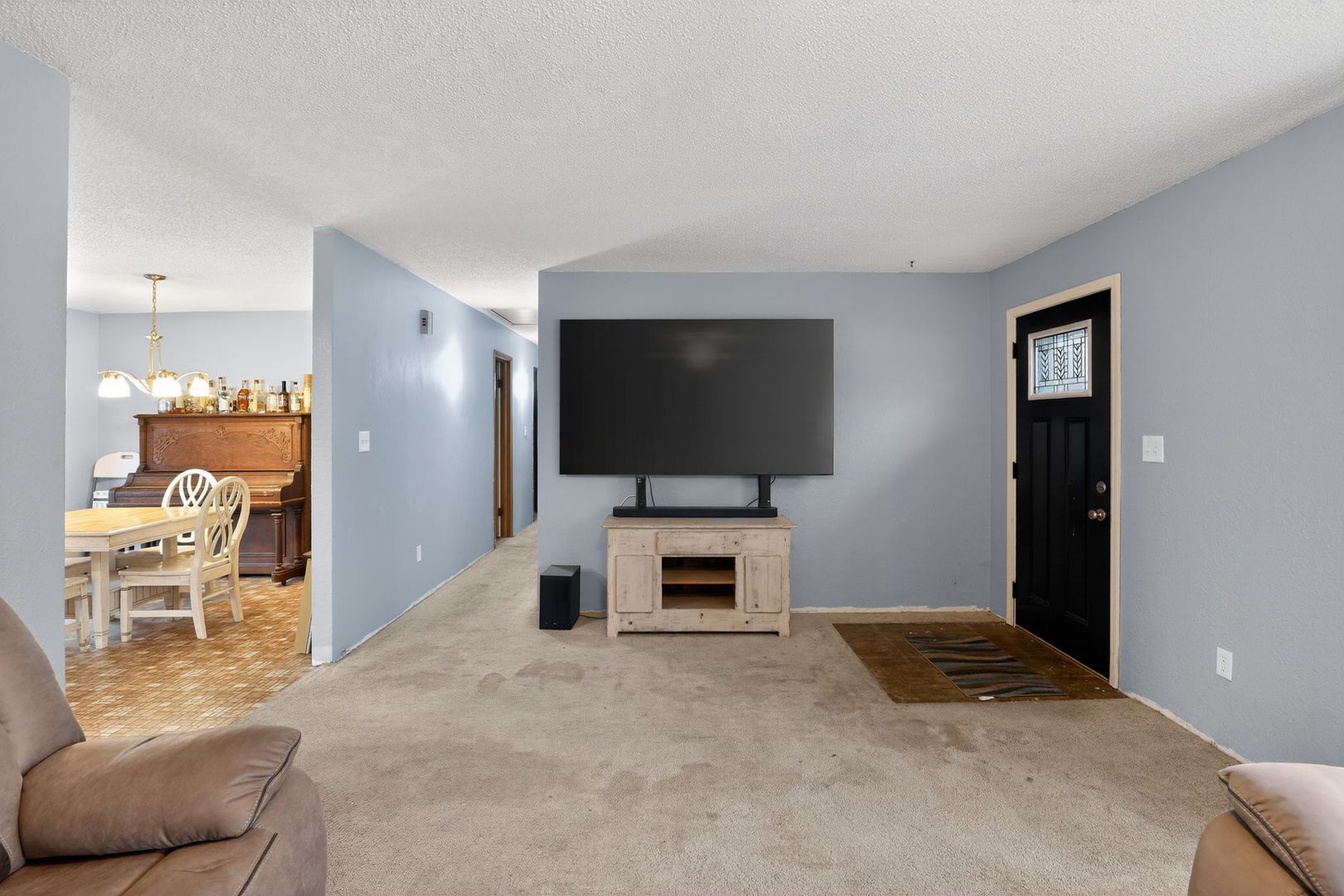 1531 North Charleston Road Salem, IL 62881 - Photo 7 of 34 a living room with furniture and a flat screen tv