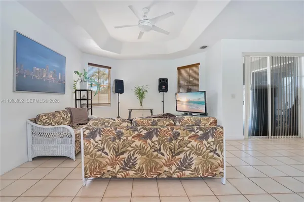 a living room with furniture and a table