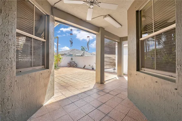 a view of a backyard of the house