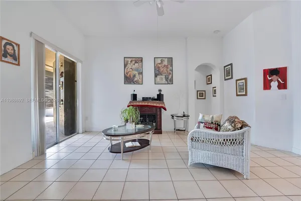 a living room with furniture and window