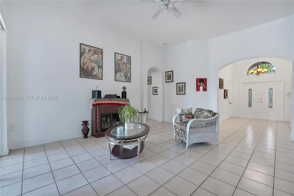 a living room with furniture and a table