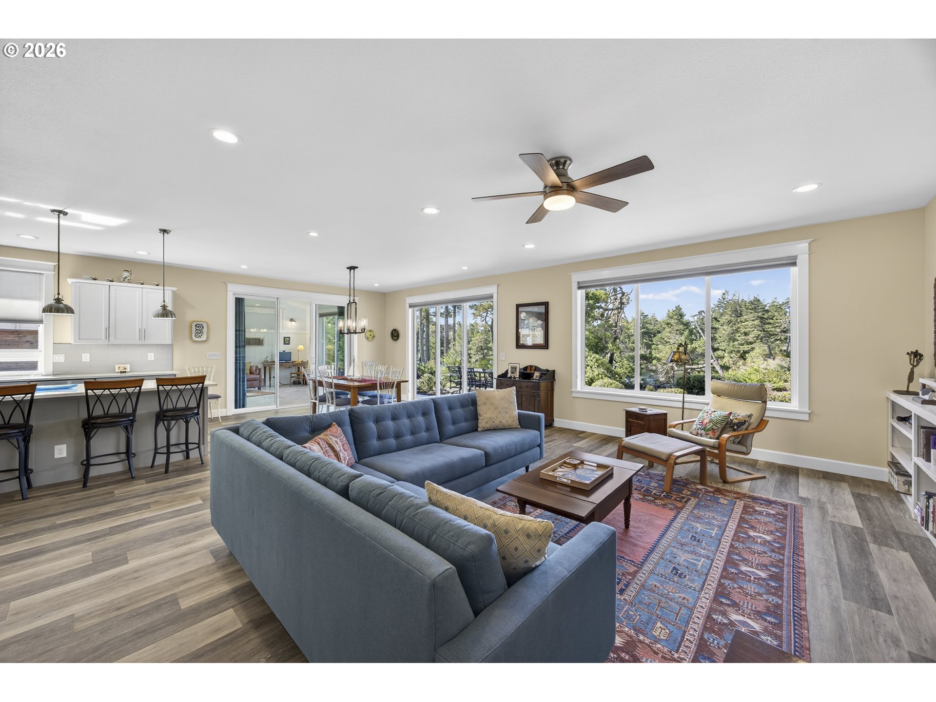 88084 Lake Point Drive Florence, OR 97439 - Photo 11 of 22 a living room with furniture and a large window