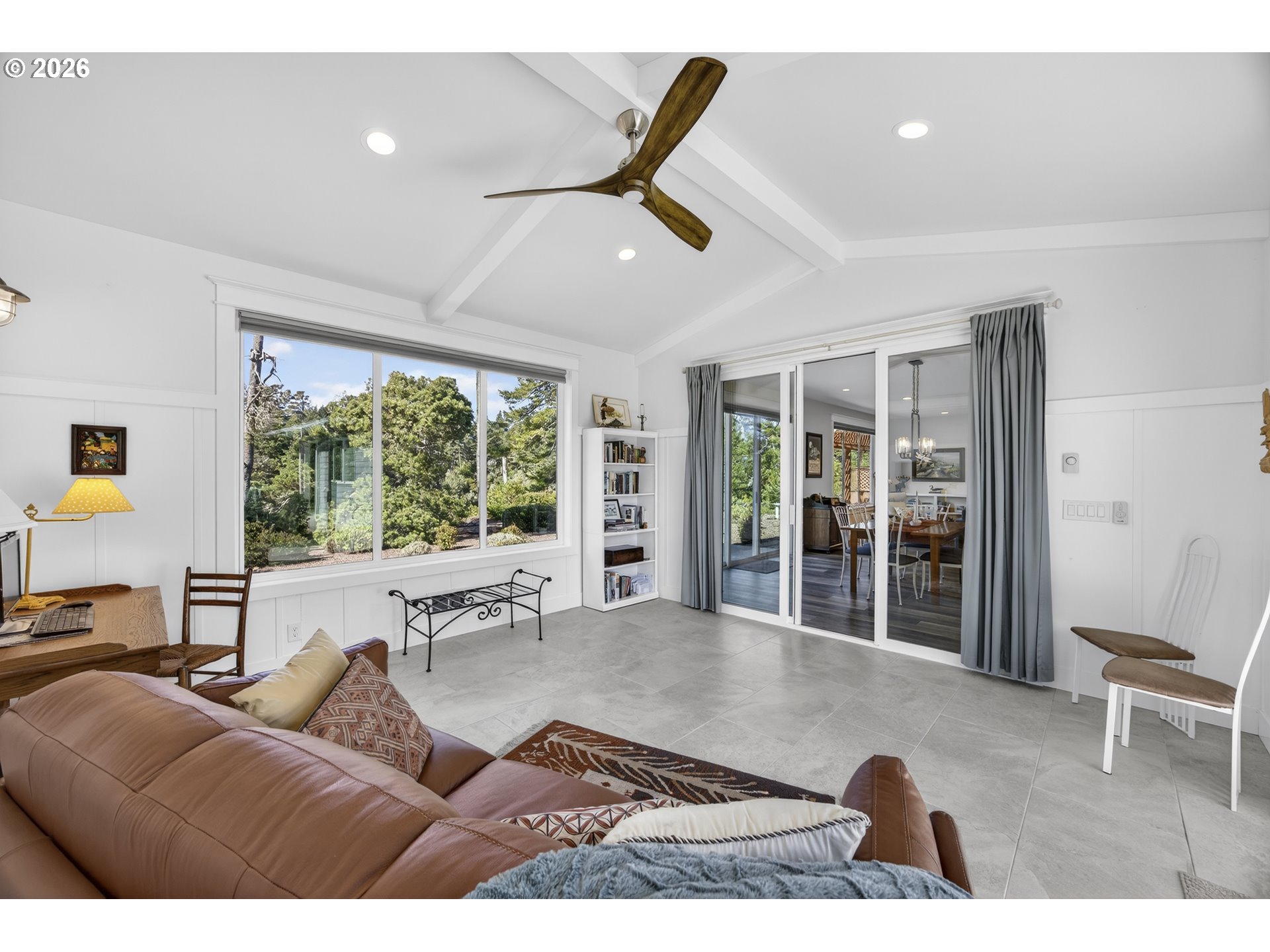 88084 Lake Point Drive Florence, OR 97439 - Photo 18 of 22 a living room with furniture and a large window