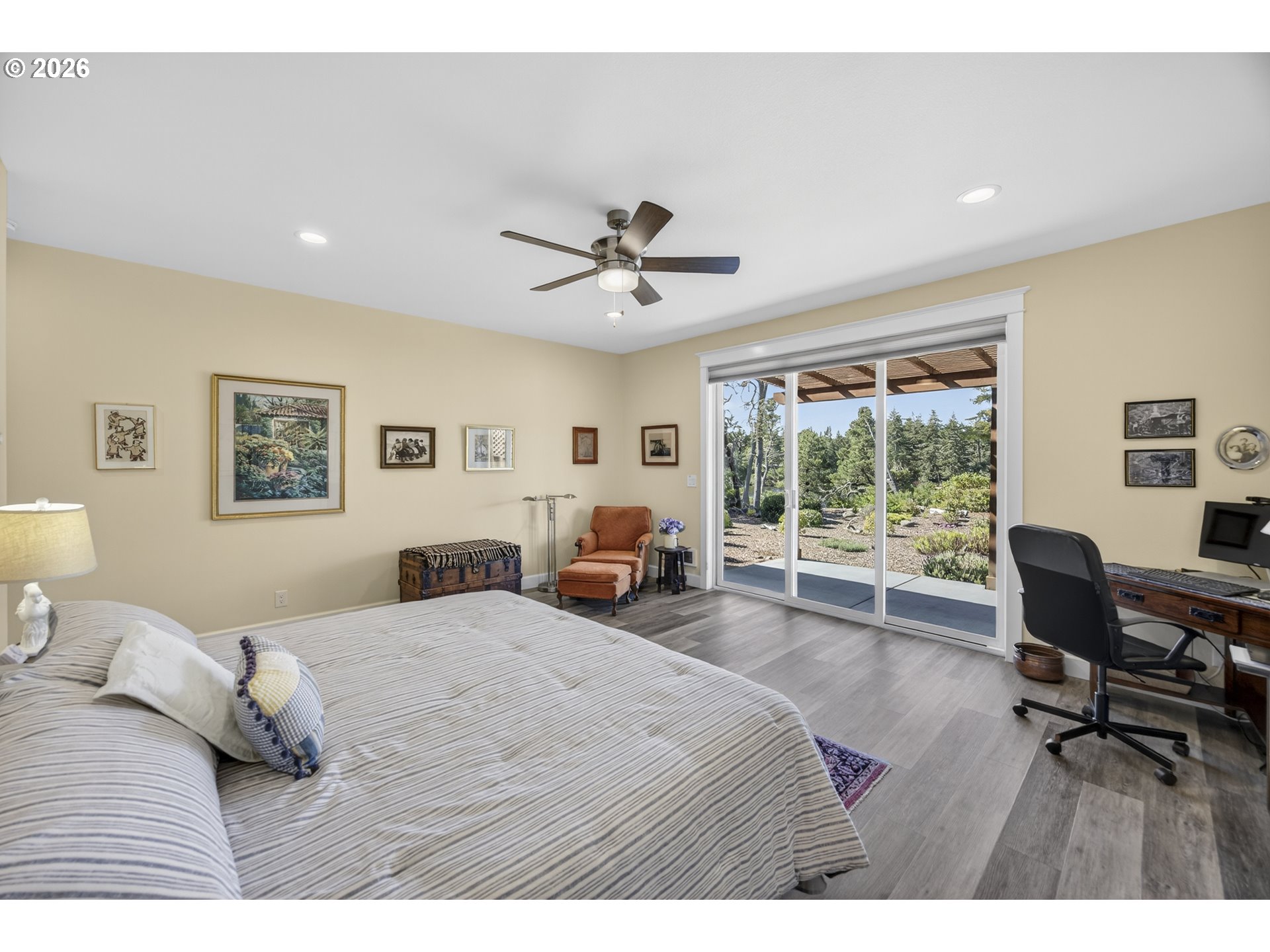 88084 Lake Point Drive Florence, OR 97439 - Photo 21 of 22 a bedroom with a bed and a large window