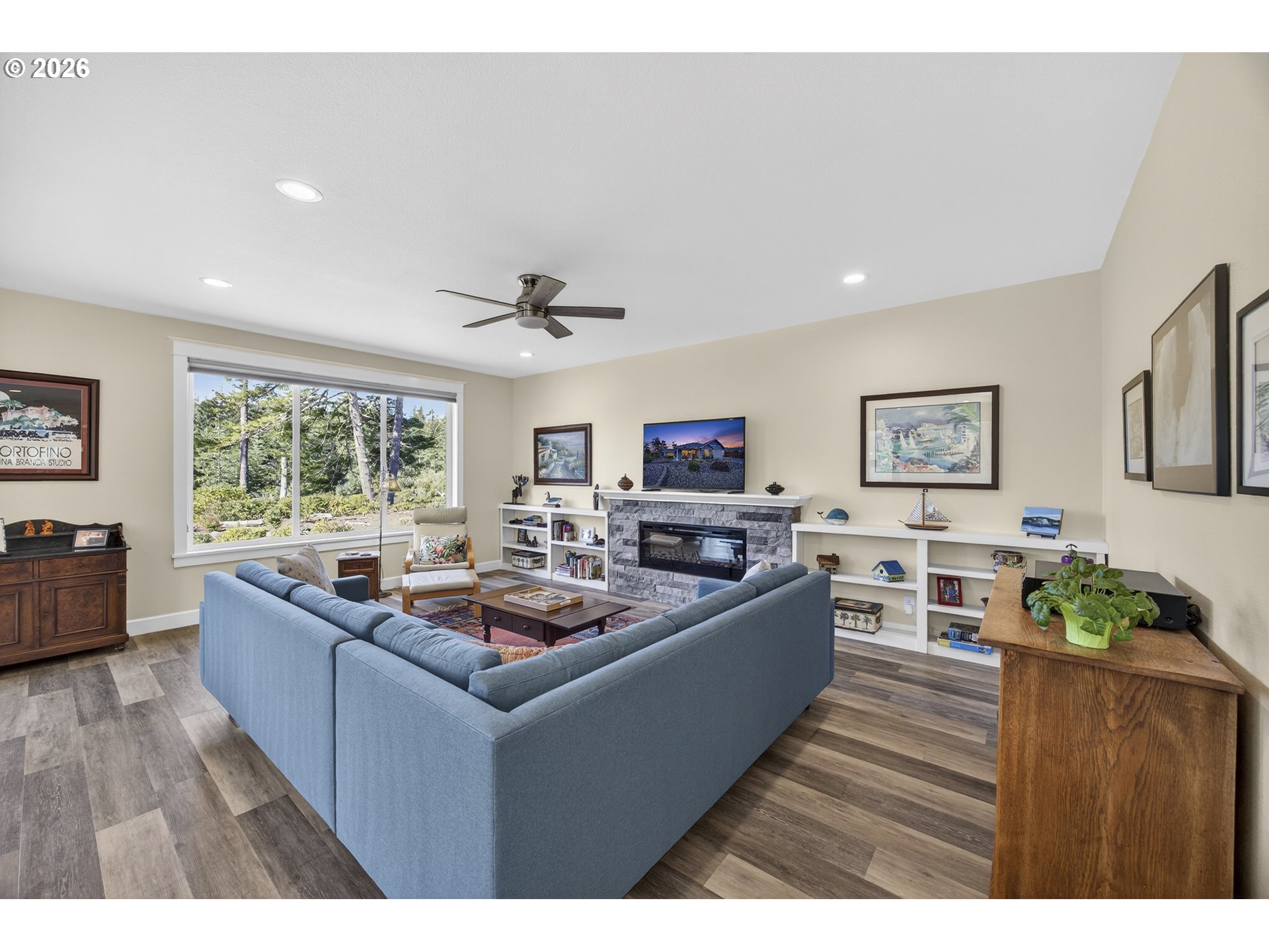 88084 Lake Point Drive Florence, OR 97439 - Photo 10 of 22 a living room with furniture and a large window
