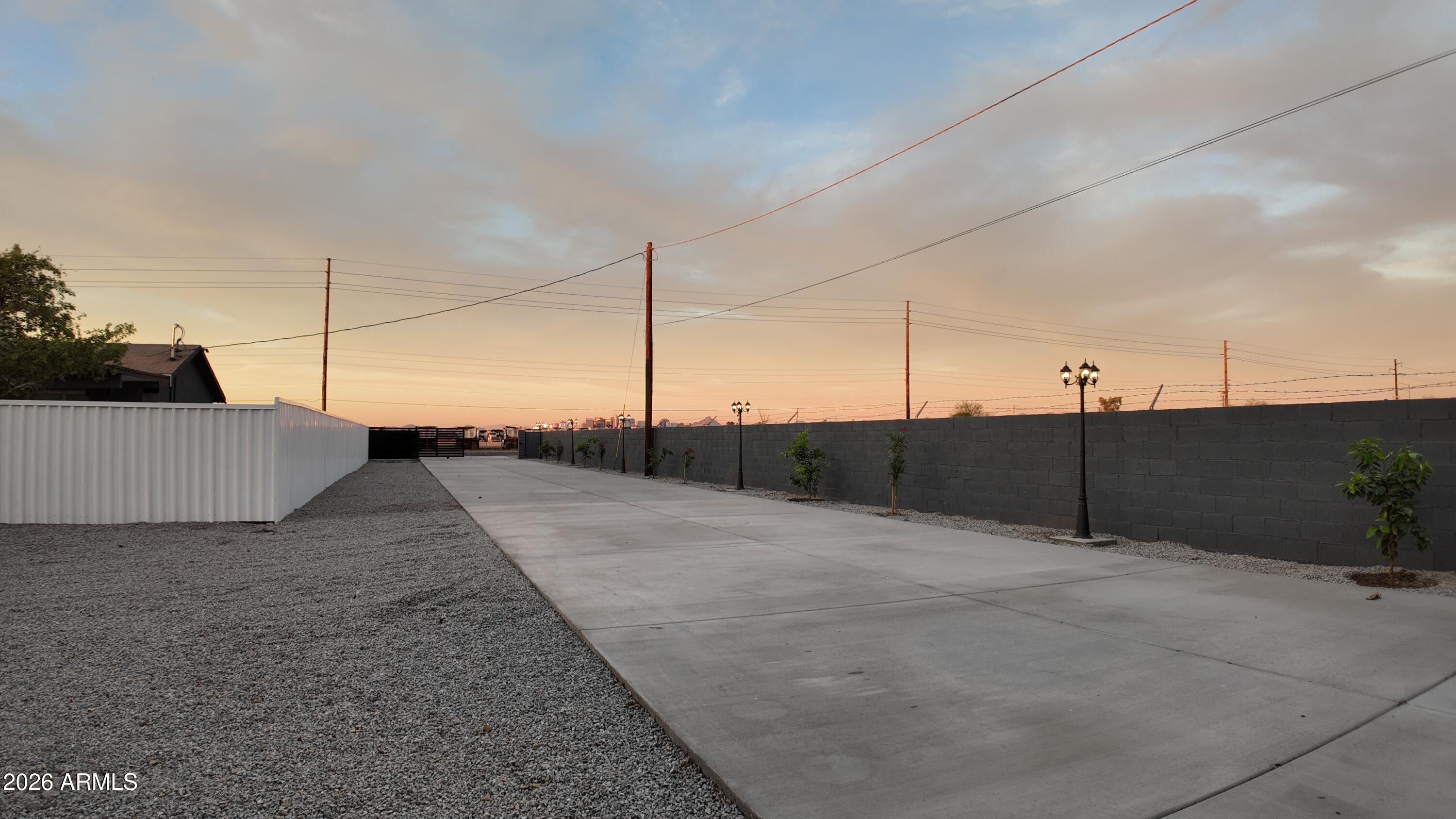 1109 West Broadway Road, Unit B Phoenix, AZ 85041 - Photo 14 of 16 driveway entrance