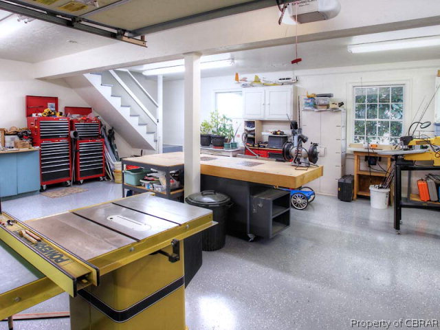 6736 Ware Neck Road Gloucester, VA 23061 - Photo 28 of 34 Deluxe workshop is heated and cooled and has additional storage above plus oversized 2 car garage attached to home by a protected breezeway.