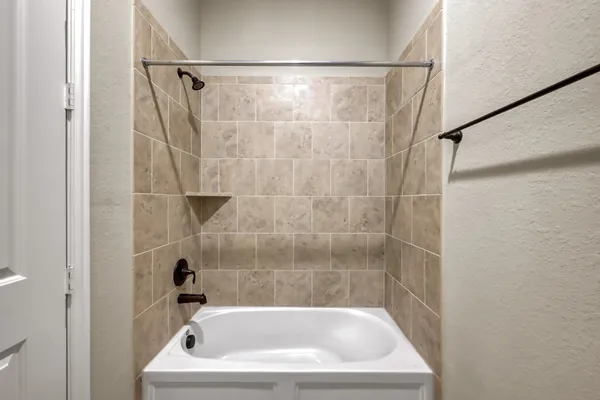 a bathroom with a bathtub