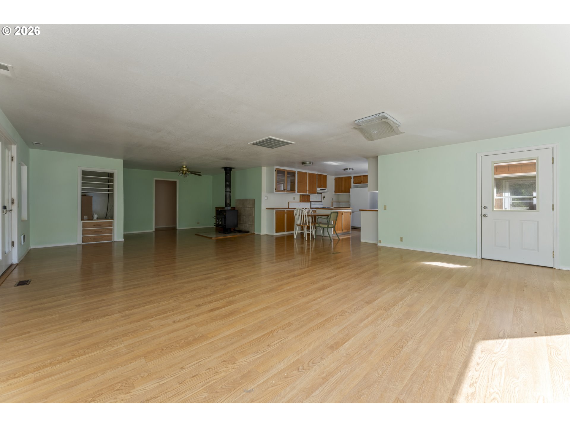 67085 Marlow Creek Road Coos Bay, OR 97420 - Photo 11 of 48 a view interior of a house wooden floor and an empty room