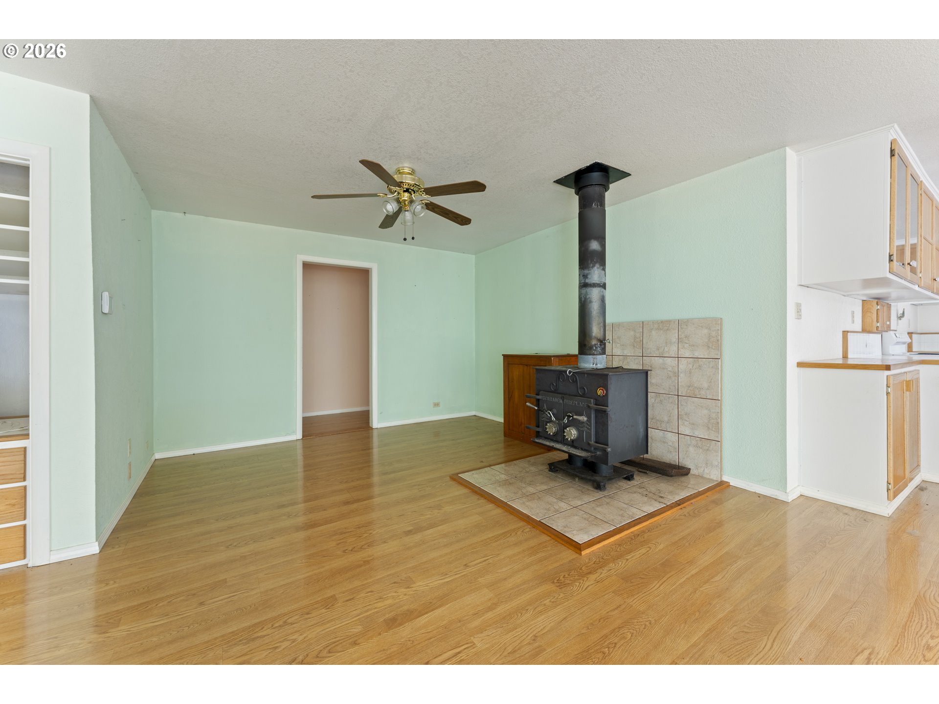 67085 Marlow Creek Road Coos Bay, OR 97420 - Photo 12 of 48 a living room with hard wood flooring