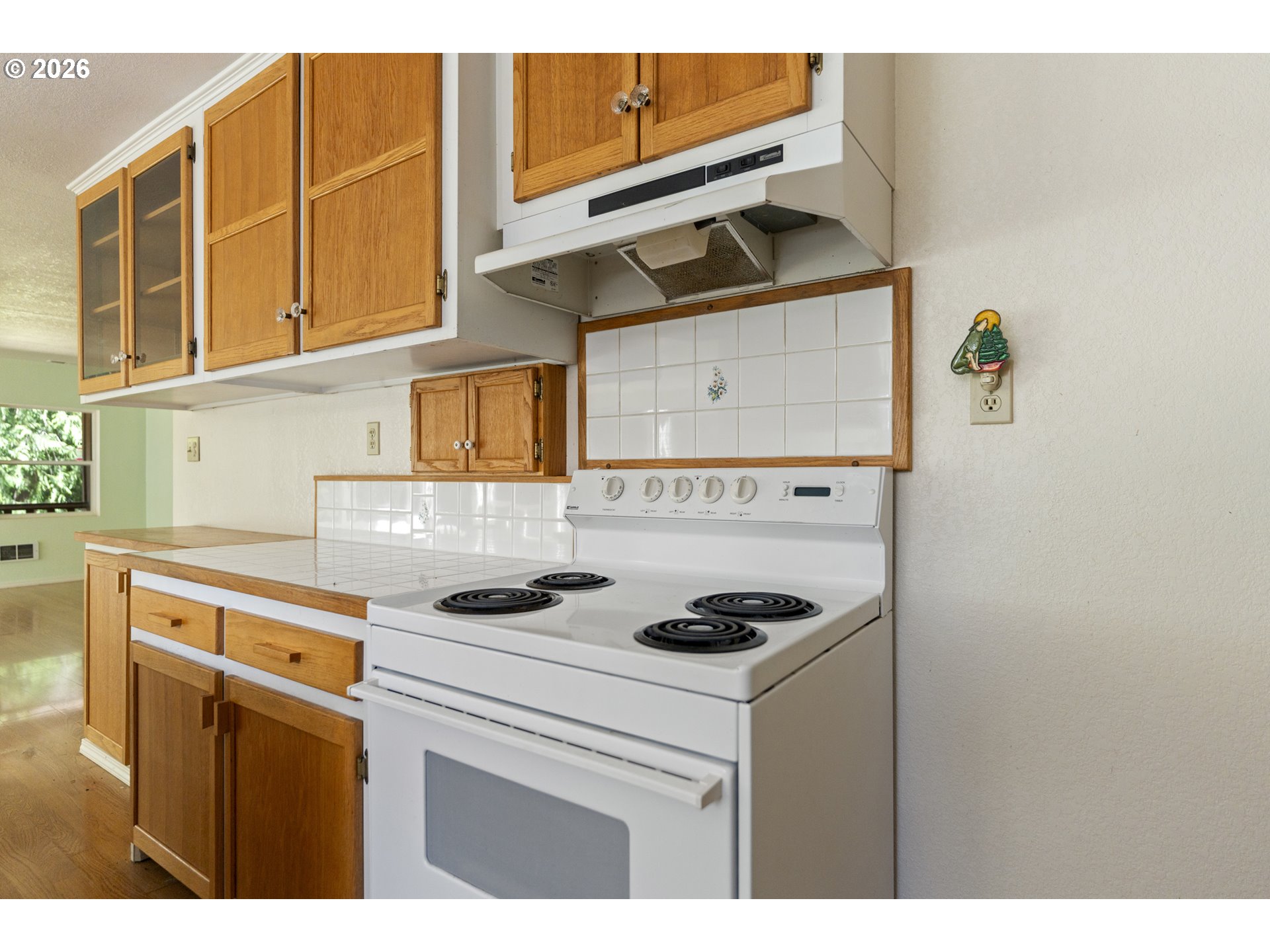 67085 Marlow Creek Road Coos Bay, OR 97420 - Photo 14 of 48 a kitchen with a stove and a cabinets