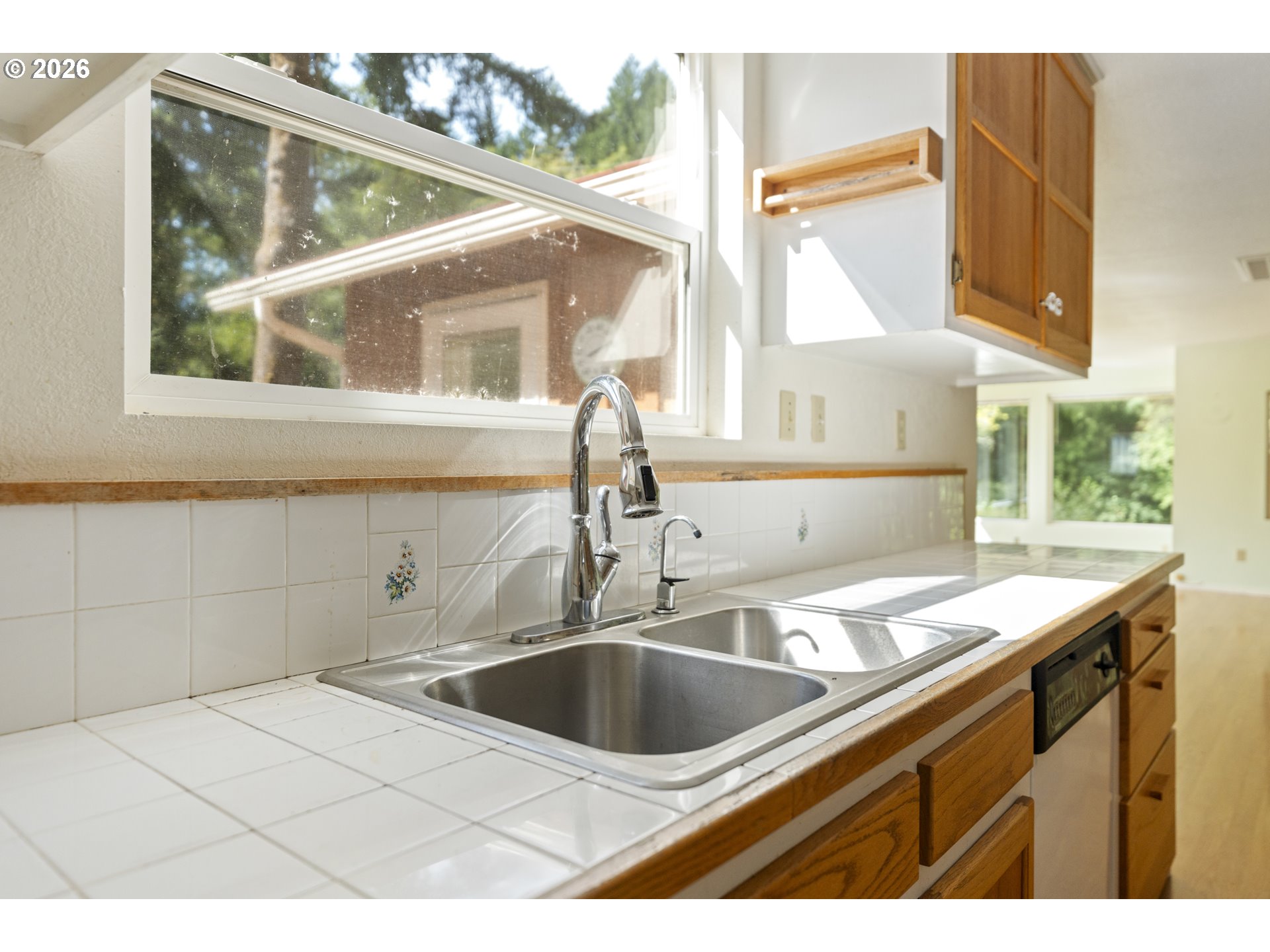 67085 Marlow Creek Road Coos Bay, OR 97420 - Photo 15 of 48 a kitchen with a sink and a window