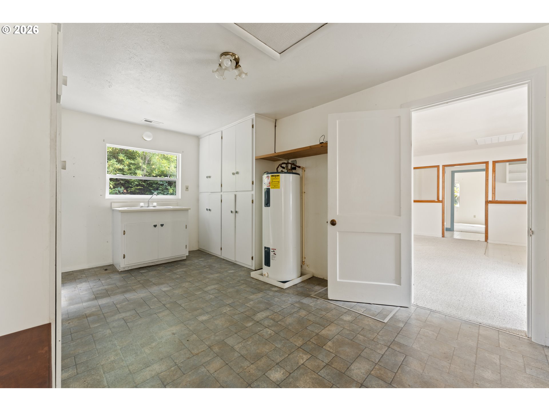 67085 Marlow Creek Road Coos Bay, OR 97420 - Photo 18 of 48 a view of empty room with windows
