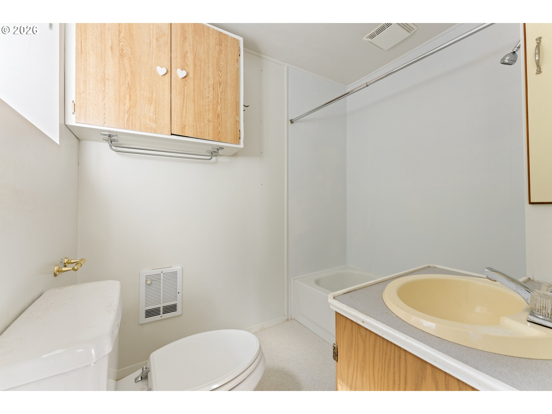 67085 Marlow Creek Road Coos Bay, OR 97420 - Photo 24 of 48 a bathroom with a sink a mirror and a toilet