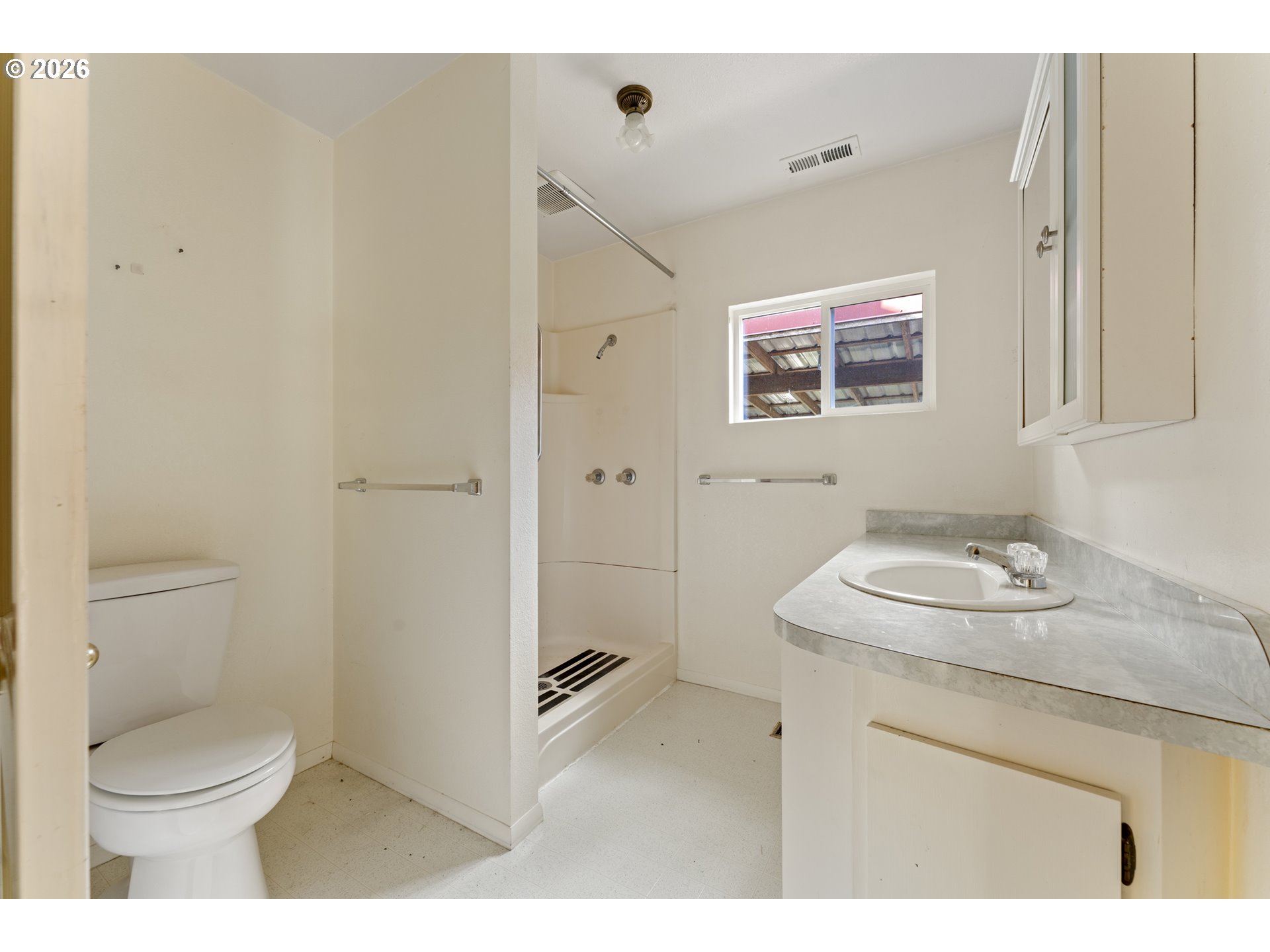 67085 Marlow Creek Road Coos Bay, OR 97420 - Photo 25 of 48 a bathroom with a sink a toilet and shower