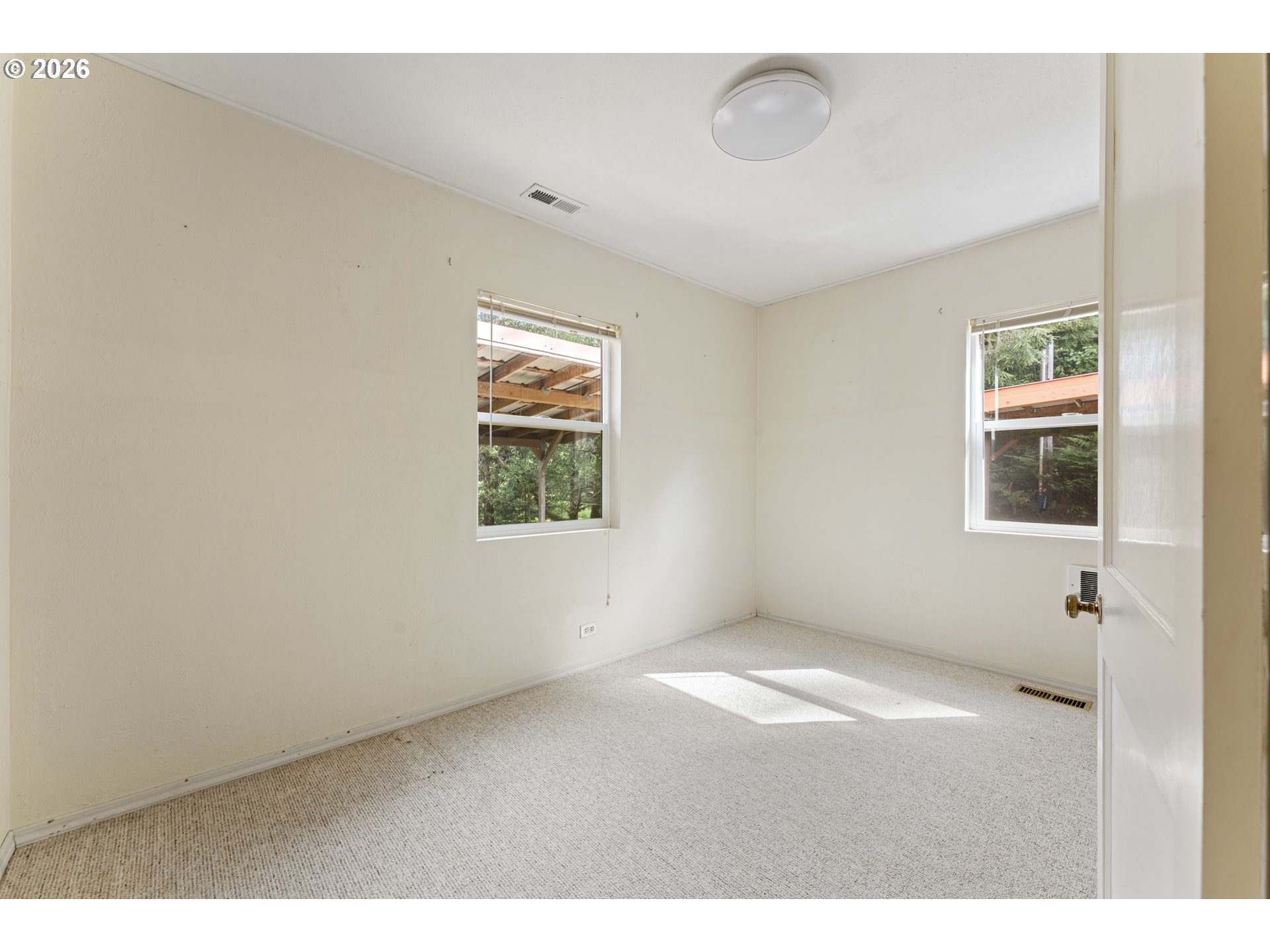 67085 Marlow Creek Road Coos Bay, OR 97420 - Photo 26 of 48 a view of an empty room with a window