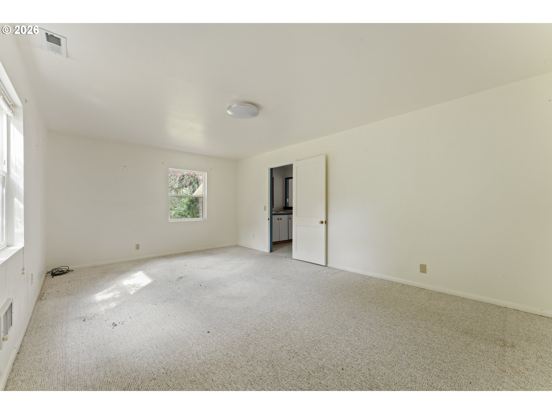 67085 Marlow Creek Road Coos Bay, OR 97420 - Photo 28 of 48 a view of an empty room with a window