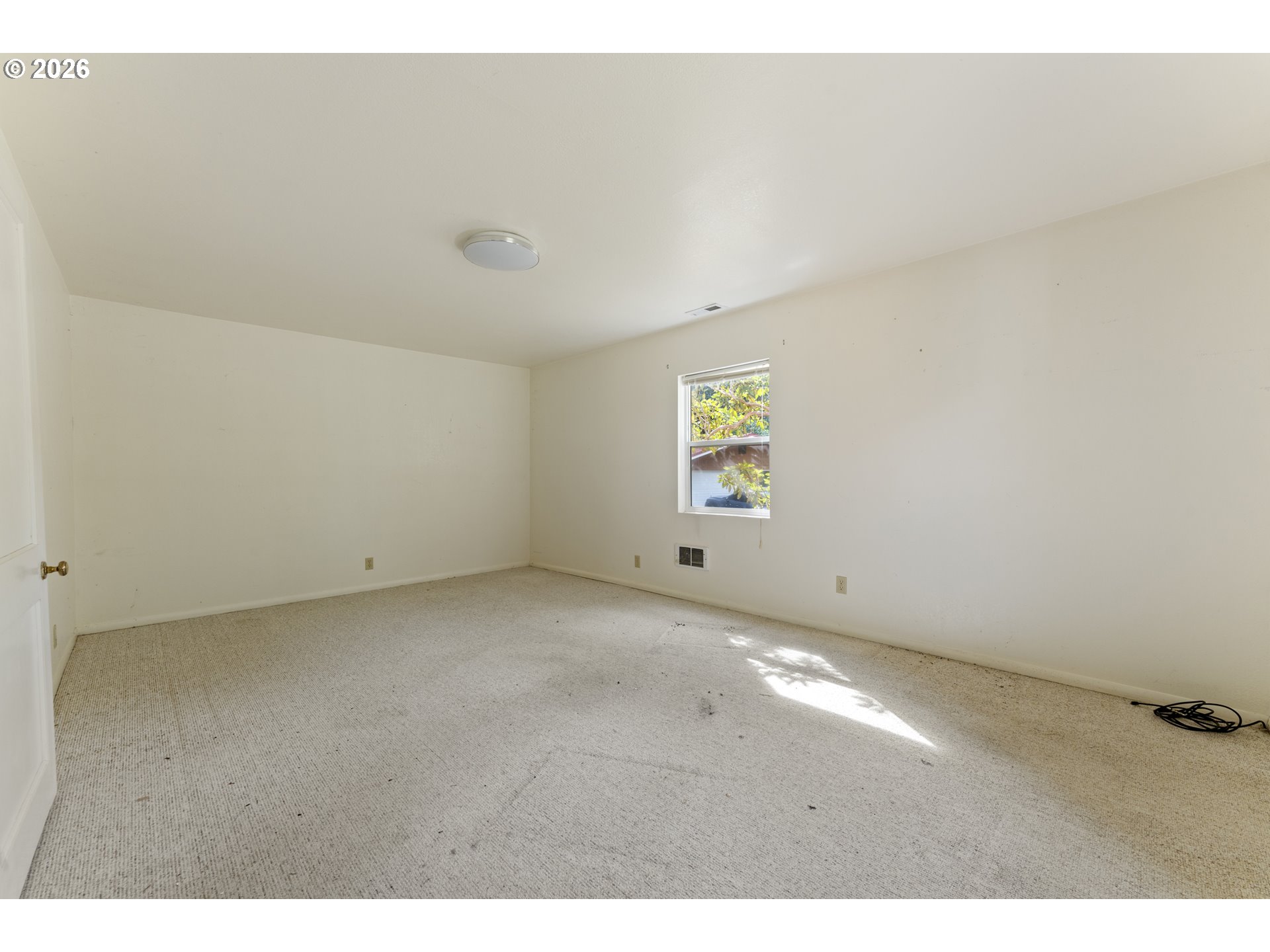 67085 Marlow Creek Road Coos Bay, OR 97420 - Photo 31 of 48 a view of an empty room with a window