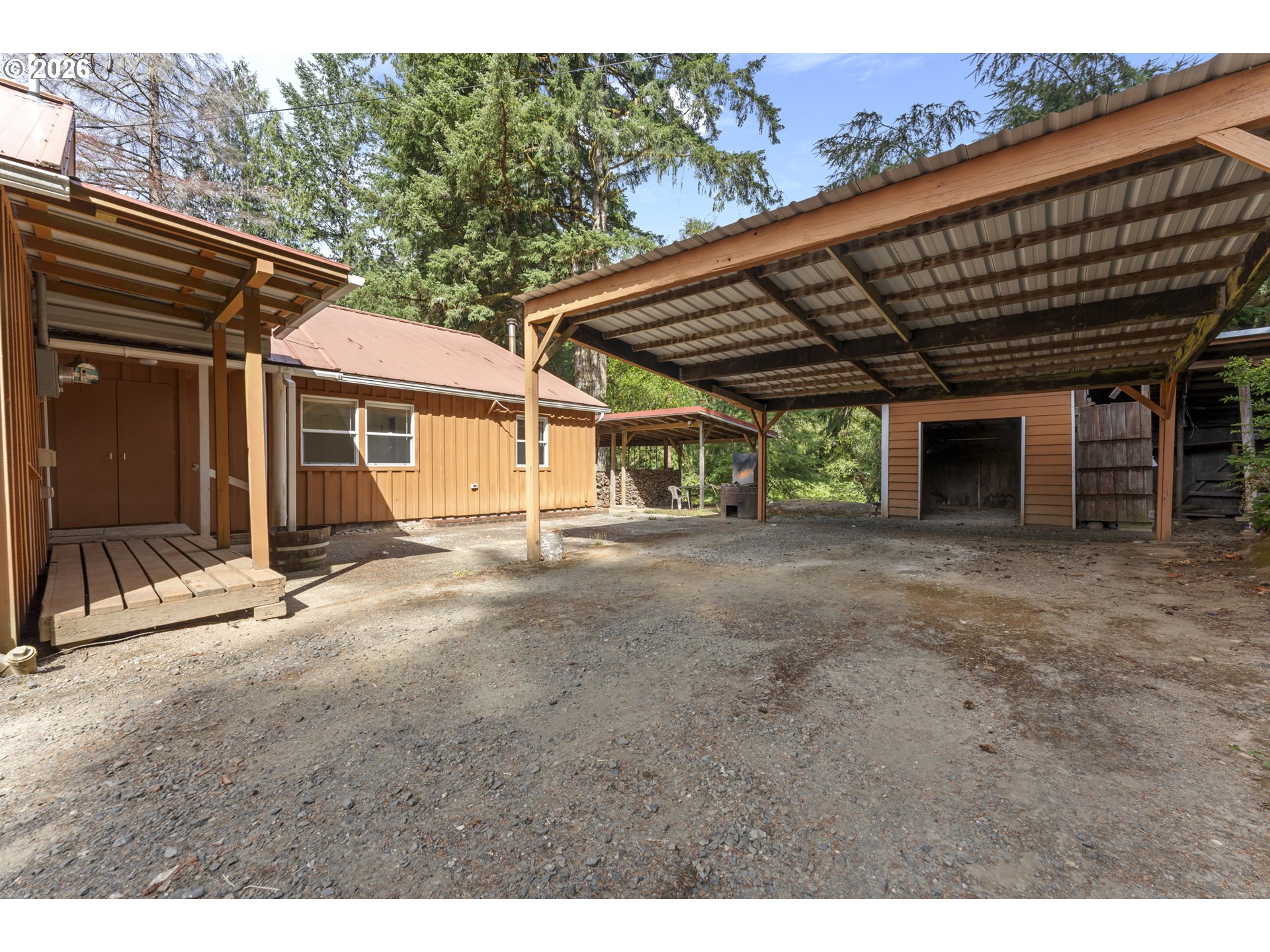 67085 Marlow Creek Road Coos Bay, OR 97420 - Photo 41 of 48 a view of a house with a backyard