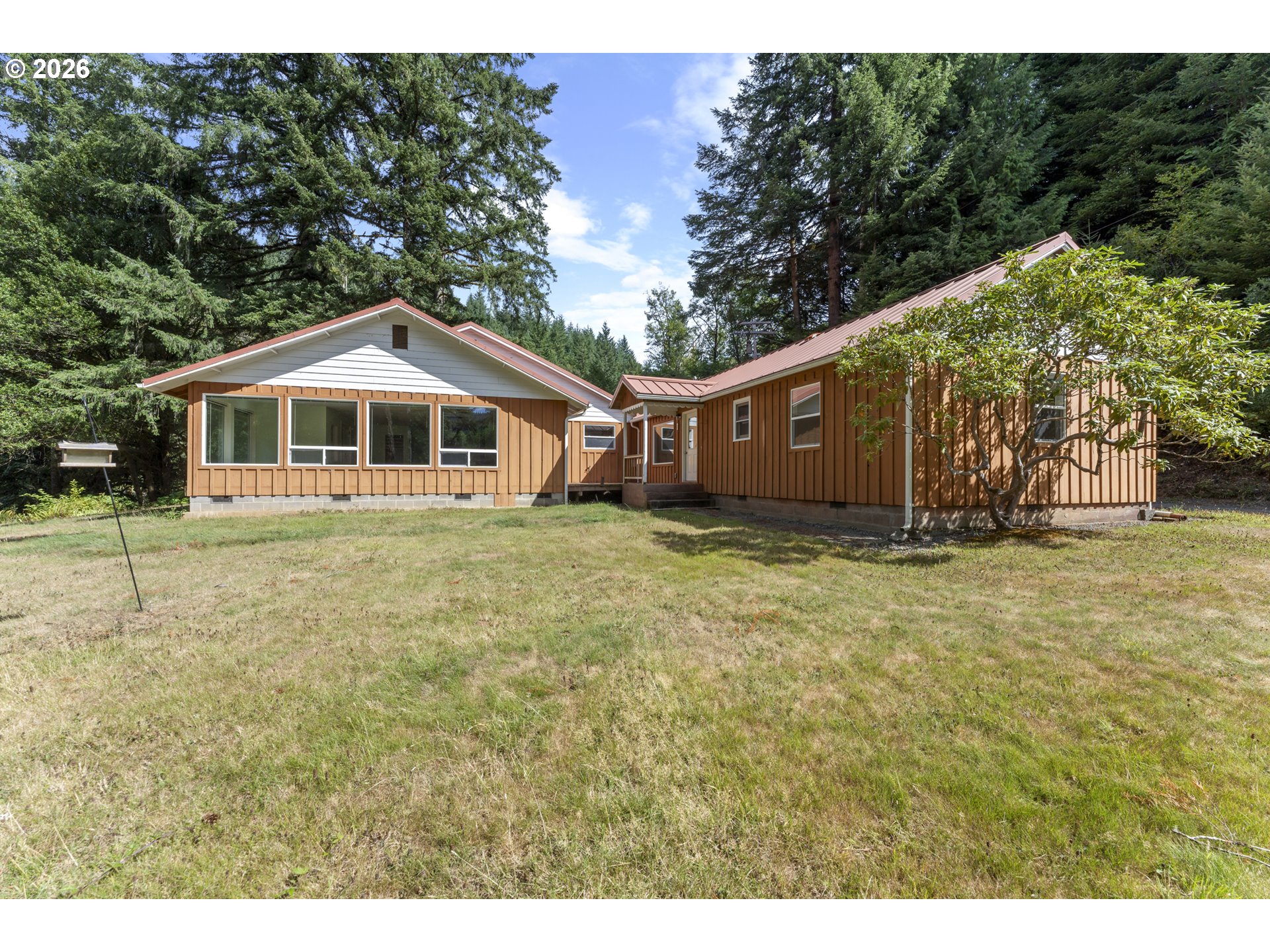 67085 Marlow Creek Road Coos Bay, OR 97420 - Photo 42 of 48 a front view of a house with a yard