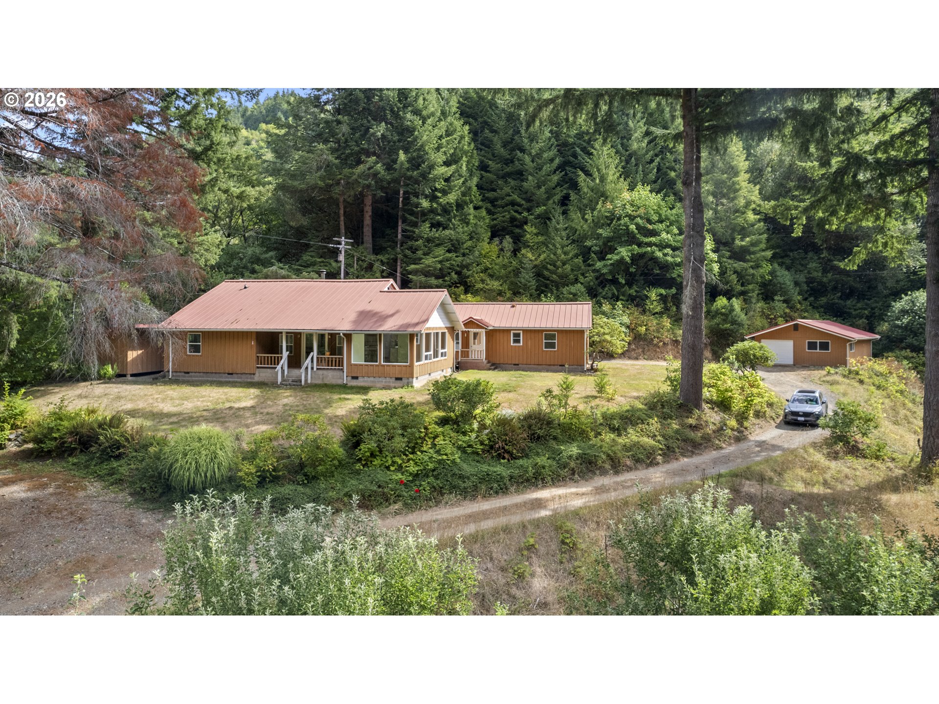 67085 Marlow Creek Road Coos Bay, OR 97420 - Photo 7 of 48 a view of a house with a backyard