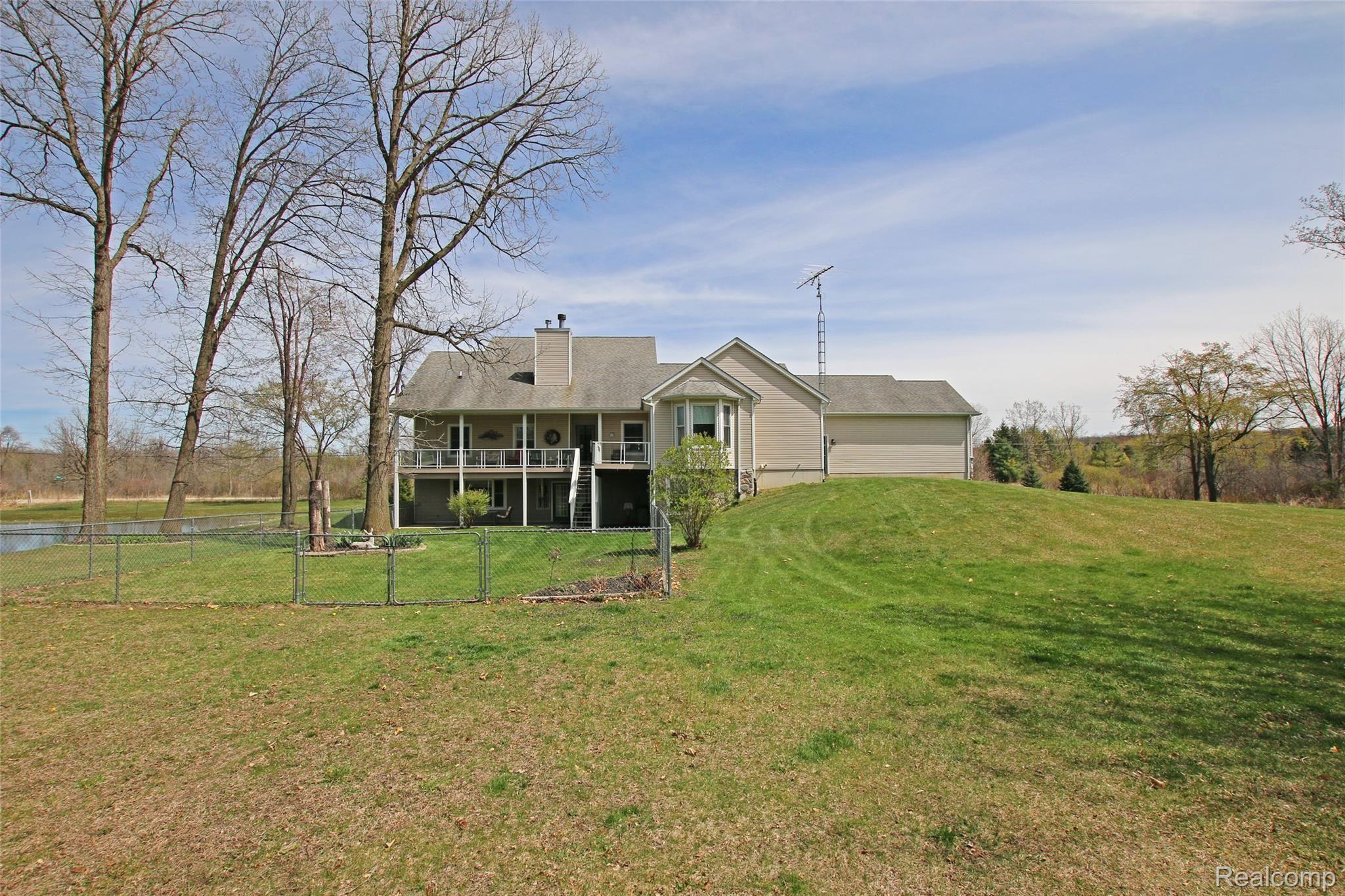 9026 Washburn Road Goodrich, MI 48438 - Photo 63 of 74 63) Back of Home.jpg