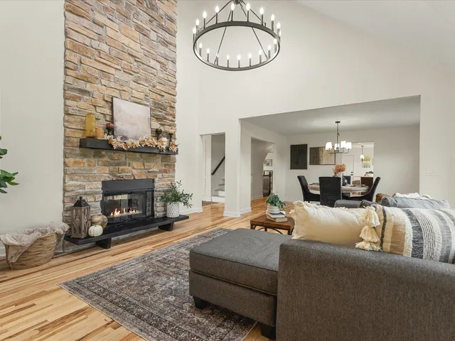 a living room with furniture a couch and a table