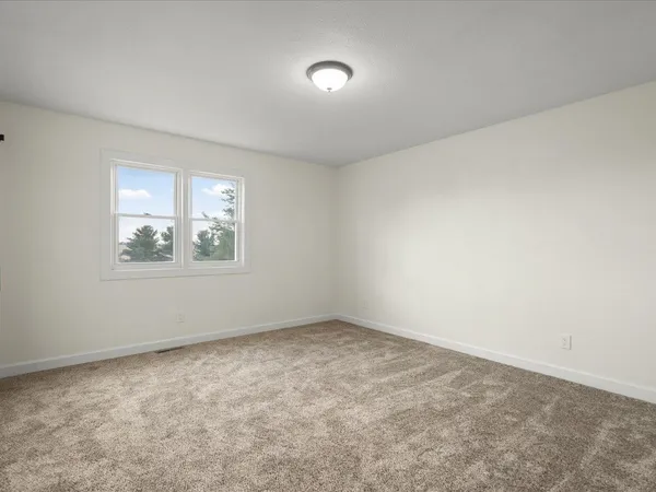 an empty room with a window