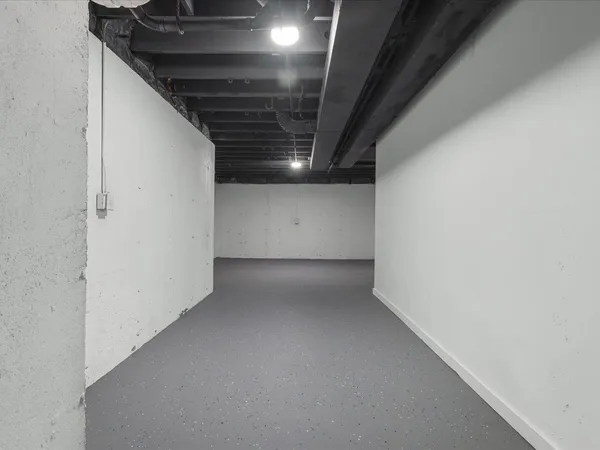 a bedroom with furniture and a bed