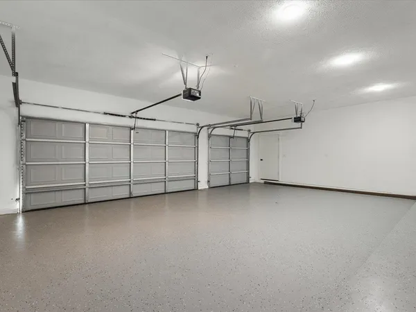 a view of a lake with a yard and a ocean view