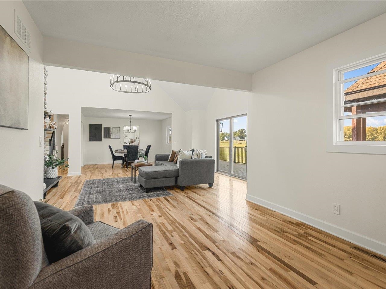 9281 Auburn Road Winnebago, IL 61088 - Photo 35 of 64 a living room with furniture and a wooden floor