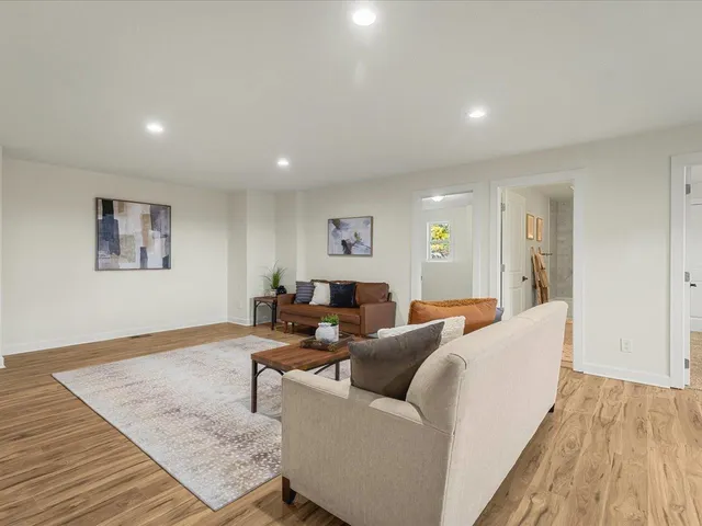 a view of an empty room with closet