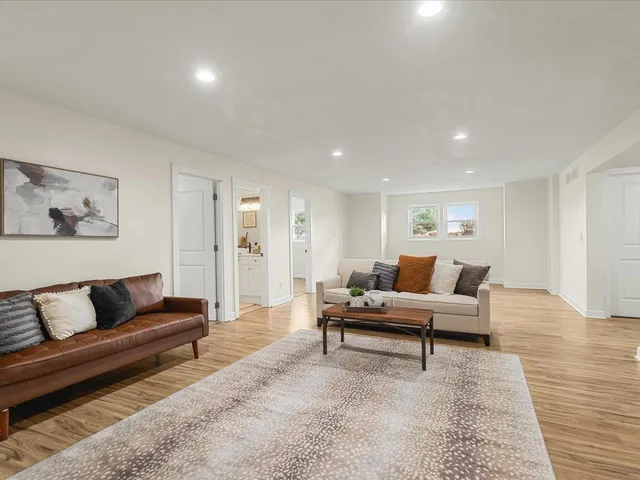 a view of balcony with wooden floor