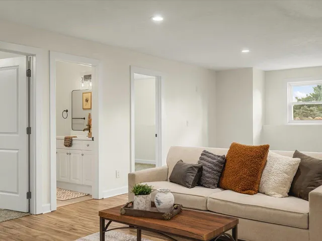 a front view of houses with yard