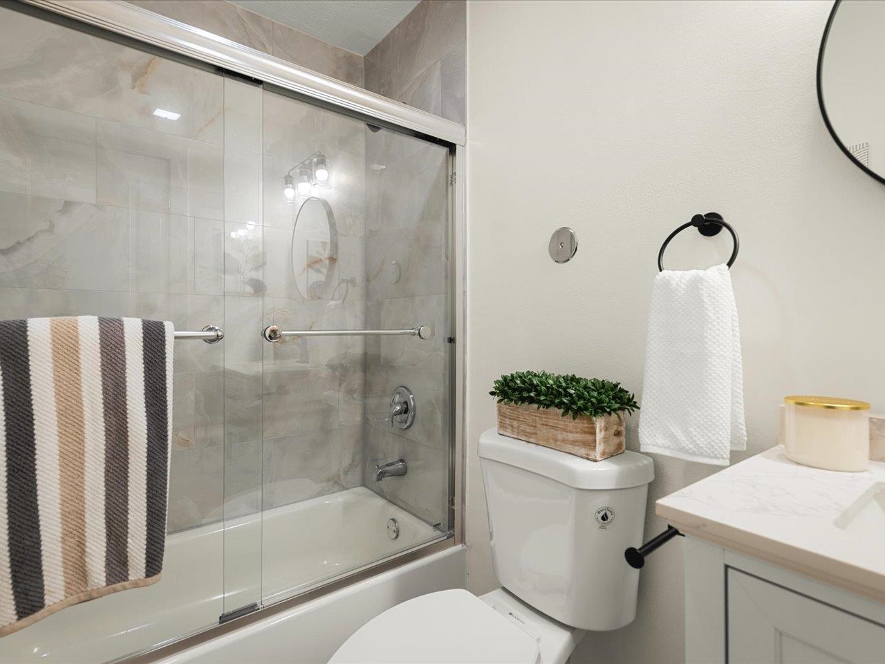 9281 Auburn Road Winnebago, IL 61088 - Photo 10 of 64 a bathroom with a sink toilet and shower